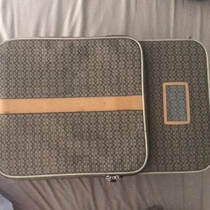 Signature brown coach luggage